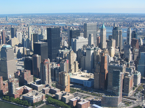 An aerial view of tightly-packed skyscrapers in lower Manhattan.